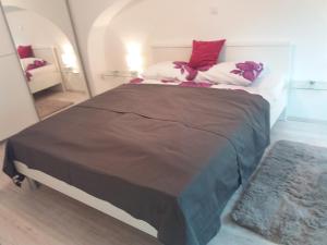 Ein Bett oder Betten in einem Zimmer der Unterkunft Apartment Osk