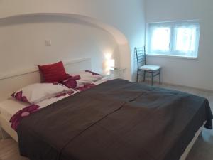 Ein Bett oder Betten in einem Zimmer der Unterkunft Apartment Osk