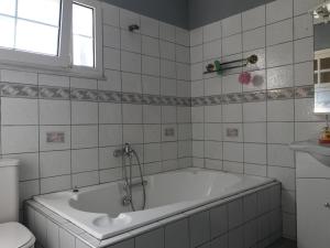 Kúpeľňa v ubytovaní Family House + 23 fotografií