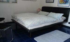 Posteľ alebo postele v izbe v ubytovaní Residenza del Pascià - Appartamento Camphora + 37 fotografií