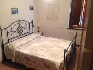A bed or beds in a room at Bed & Breakfast Ca' di Vissai