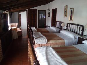 Hospederia Casa de La Torreにあるベッド