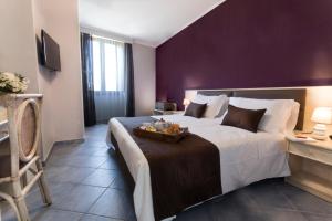 Posteľ alebo postele v izbe v ubytovaní Hotel Soleluna