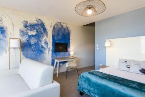 Postel nebo postele na pokoji v ubytování Baya Hotel