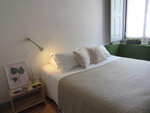 Cama ou camas em um quarto em Most Art Boutique Hostel