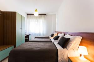 Posteľ alebo postele v izbe v ubytovaní Hotel Antagos