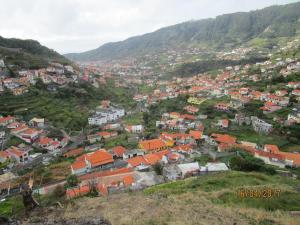 an aerial view of a town in the mountains at Marques House in Machico