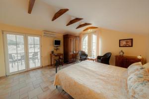Postel nebo postele na pokoji v ubytování daMonte – Apartments and rooms
