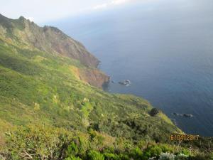 a view of the ocean from a mountain at Marques House in Machico