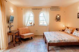 Postel nebo postele na pokoji v ubytování daMonte – Apartments and rooms