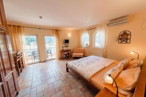 Postel nebo postele na pokoji v ubytování daMonte – Apartments and rooms