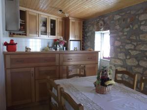 Kuchyň nebo kuchyňský kout v ubytování Casa do Tear