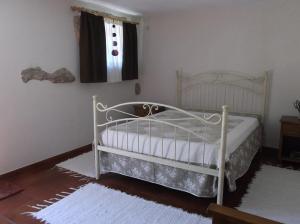 Кровать или кровати в номере Casa do Tear