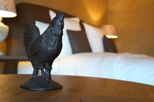 Postel nebo postele na pokoji v ubytování Boutique Hotel De Brakelhoen