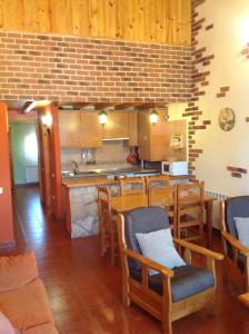 Kuchyň nebo kuchyňský kout v ubytování Casa Rural La Vega De Gredos