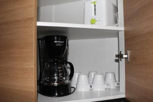 Kuchyňa alebo kuchynka v ubytovaní Apartamento Eursu centro con piscina