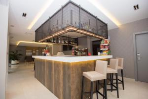 Kuchyň nebo kuchyňský kout v ubytování Hotel Perla