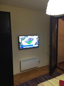 TV a/nebo společenská místnost v ubytování Mini Central
