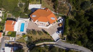 an overhead view of a house with an orange roof at Villa Omnes in Ražanj