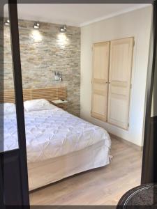 A bed or beds in a room at Marseille City Chambres&Appartements