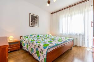 Кровать или кровати в номере Apartments Orlic