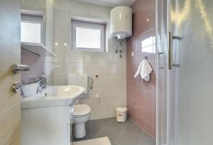 Koupelna v ubytování Apartments Kralj