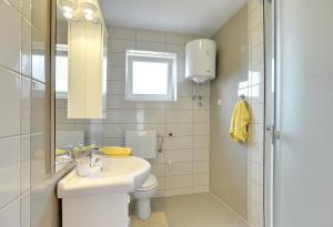 Koupelna v ubytování Apartments Kralj