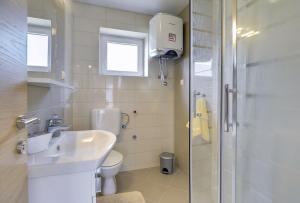 Koupelna v ubytování Apartments Kralj