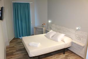 Postel nebo postele na pokoji v ubytování Te Maná Hotel