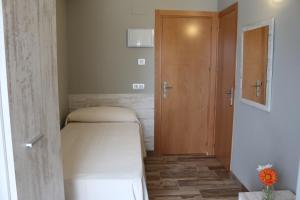 Postel nebo postele na pokoji v ubytování Te Maná Hotel