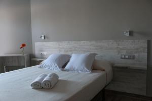 Ένα ή περισσότερα κρεβάτια σε δωμάτιο στο Te Maná Hotel