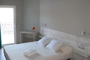 Postel nebo postele na pokoji v ubytování Te Maná Hotel