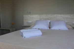 Postel nebo postele na pokoji v ubytování Te Maná Hotel
