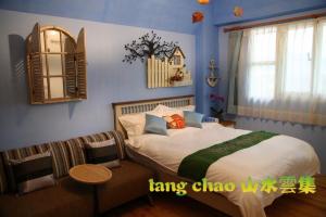 Voodi või voodid majutusasutuse Shang Shui Yun Ji B&B toas