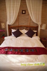 Voodi või voodid majutusasutuse Shang Shui Yun Ji B&B toas
