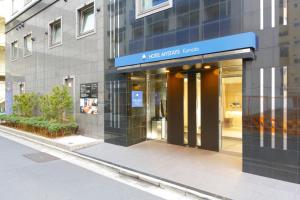 a store front of a building on a city street at HOTEL MYSTAYS Kamata in Tokyo