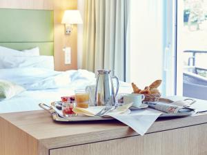 Postel nebo postele na pokoji v ubytování Mondorf Parc Hotel & Spa