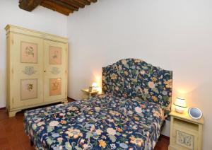 Postel nebo postele na pokoji v ubytování Agriturismo Tenuta Vallelunga