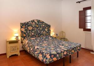 Postel nebo postele na pokoji v ubytování Agriturismo Tenuta Vallelunga