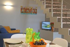 TV a/nebo společenská místnost v ubytování Appartamenti Bellavista
