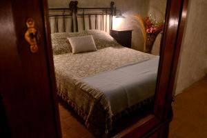 Postel nebo postele na pokoji v ubytování Robur Marsorum Albergo Diffuso
