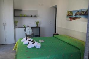 Postel nebo postele na pokoji v ubytování la Terrazza B&B