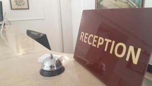 a computer monitor with the word recognition on it on a table at Palatium Mari in Capri +37 photos