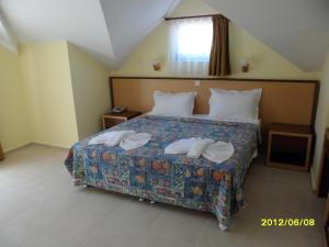 Postel nebo postele na pokoji v ubytování Felice Hotel