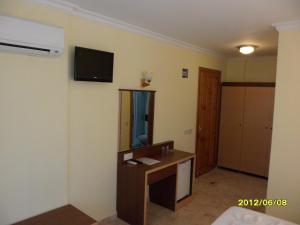 TV a/nebo společenská místnost v ubytování Felice Hotel