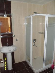Koupelna v ubytování Felice Hotel
