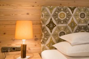 Giường trong phòng chung tại Hotel Garni Glockenstuhl