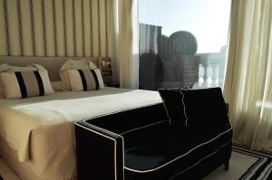 Кровать или кровати в номере Gran Hotel Sardinero