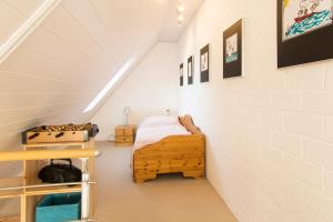 En eller flere senge i et værelse på Ferienwohnung Gilg