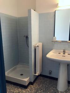 Koupelna v ubytování Hotel la Parata